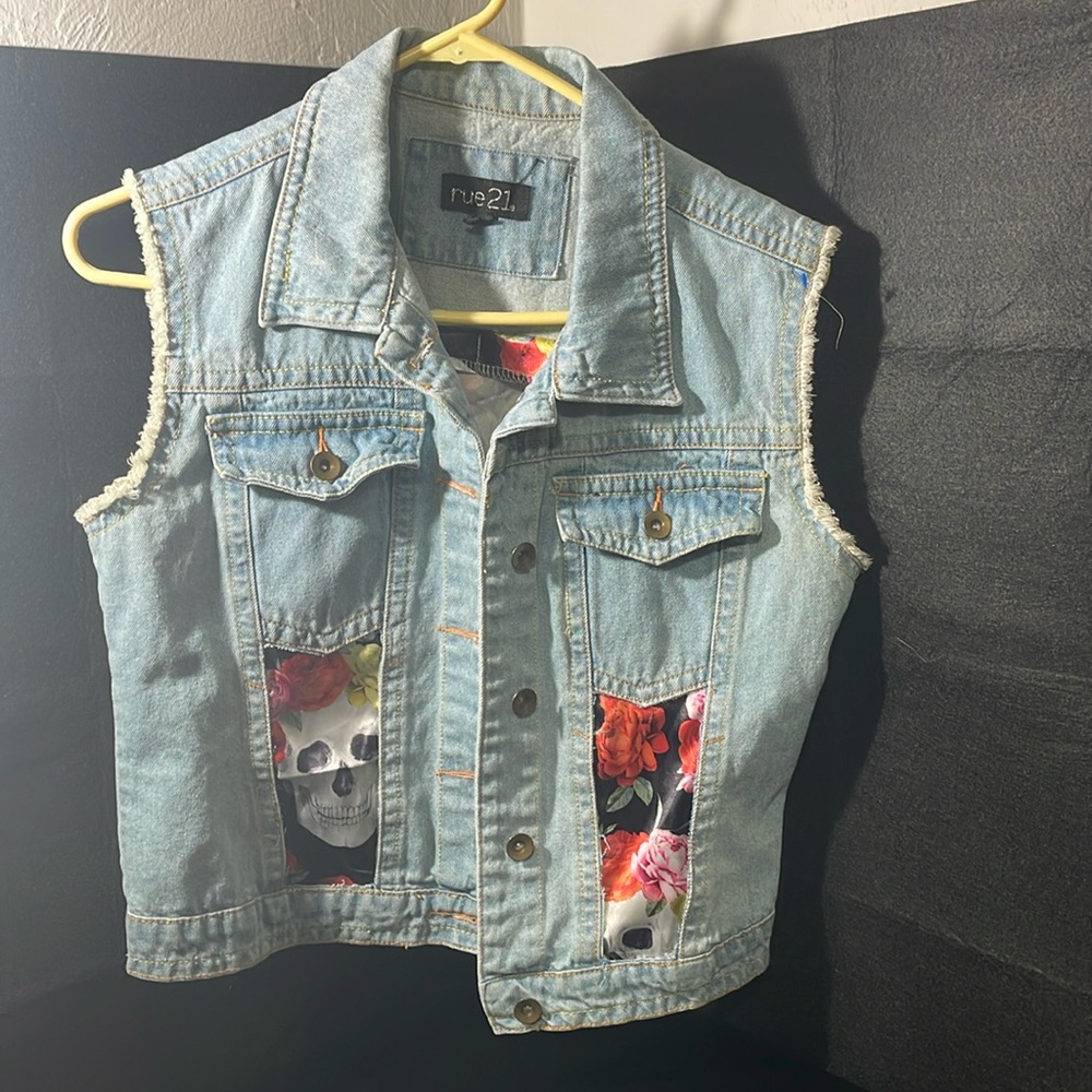 Rue 21, skull Jean distressed vest. Size youth large.